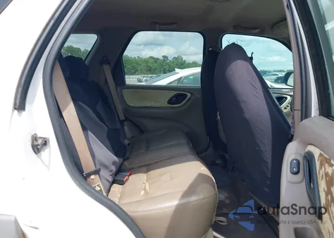 2001 Ford Escape Xlt z USA, uszkodzony, nr VIN 1FMYU03111KB11945